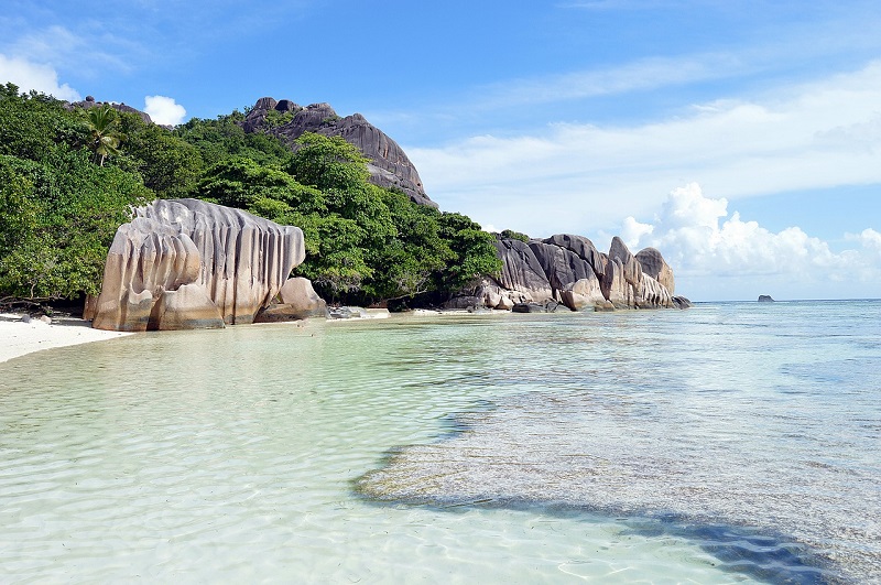 Winter Sun Destinations, Seychelles, Granite rocks, blue sea and white sand.